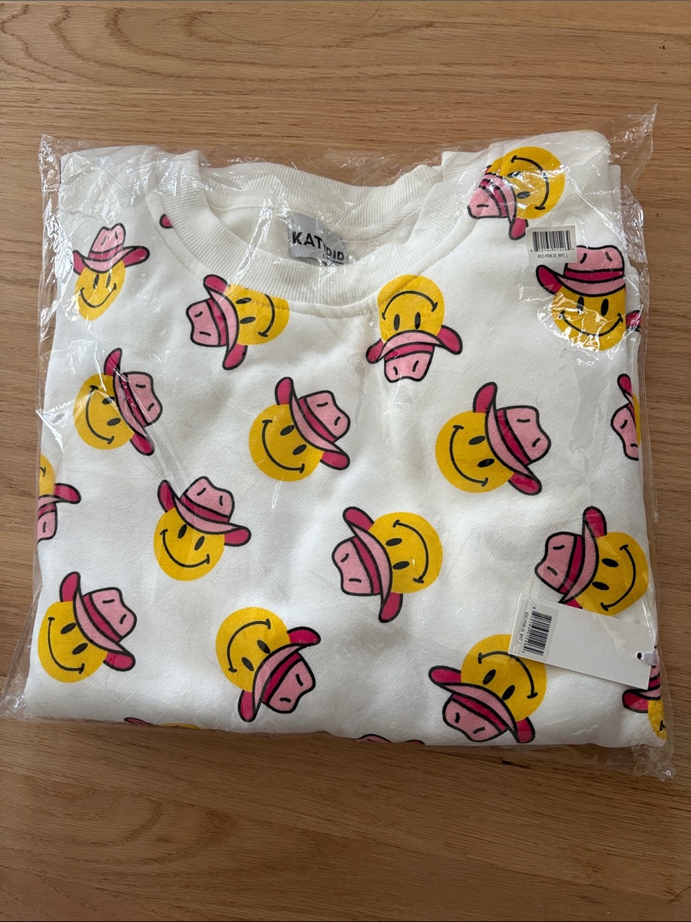 Katydid White Sweatshirt with Yellow Smiley and Pink Cowboy Hat Print